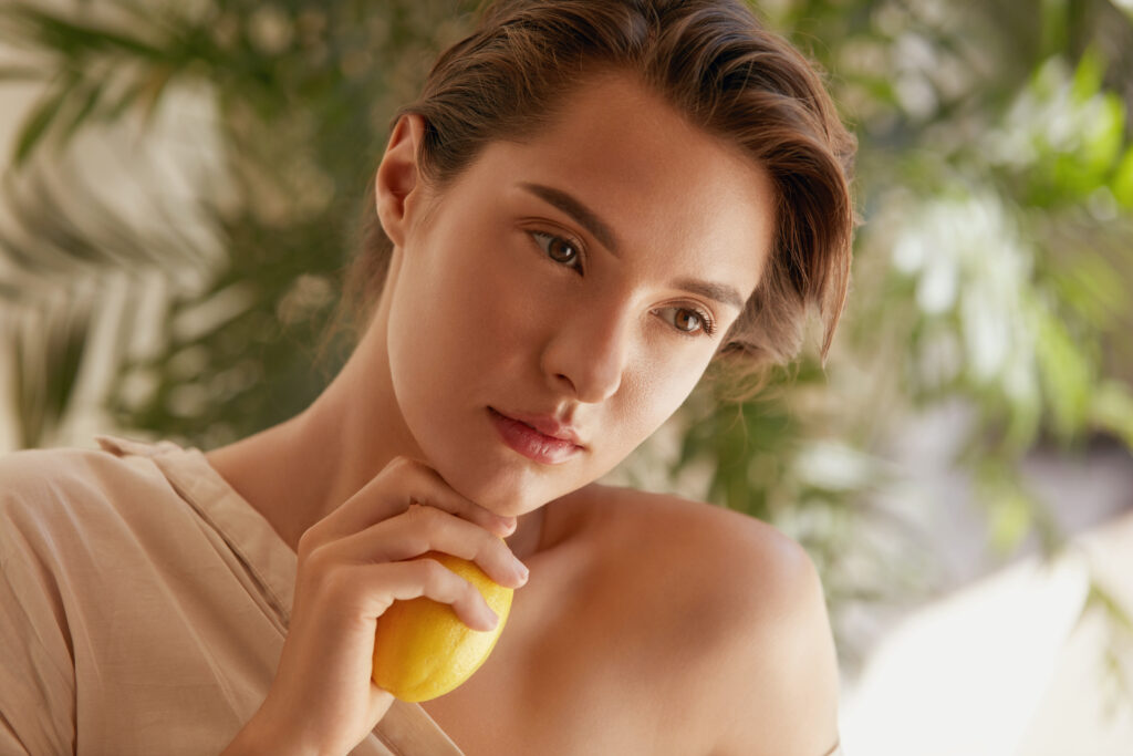 Woman Modeling with a Lemon